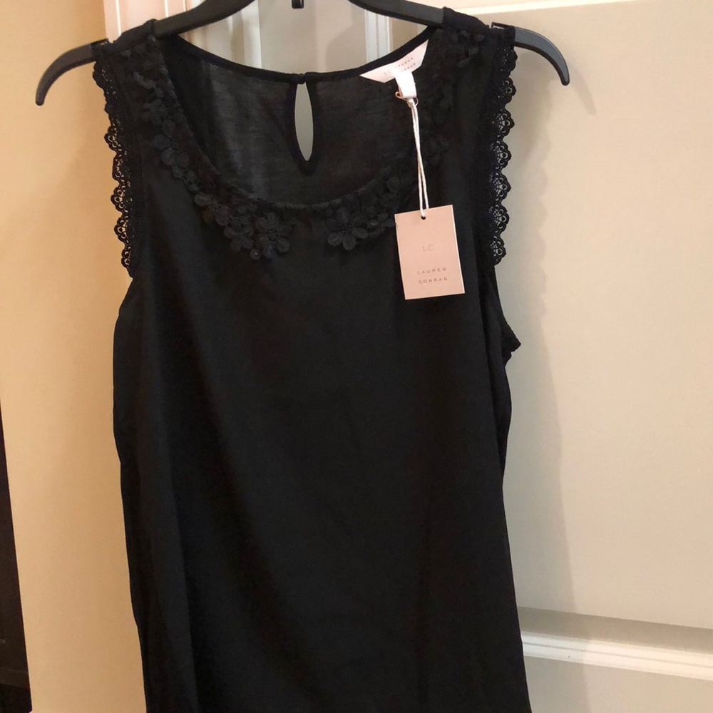 Sleeveless black blouse